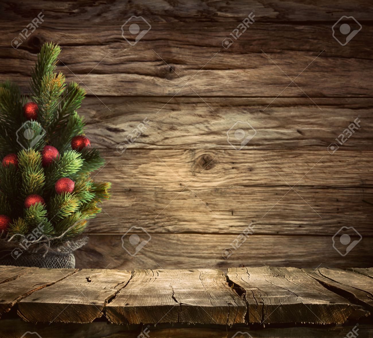 Christmas background. Empty table for your montage. Xmass tree on wood. Space for text - 48977427 Christmas background. Empty table for your montage. Xmass tree on wood. Space for text - 48977427