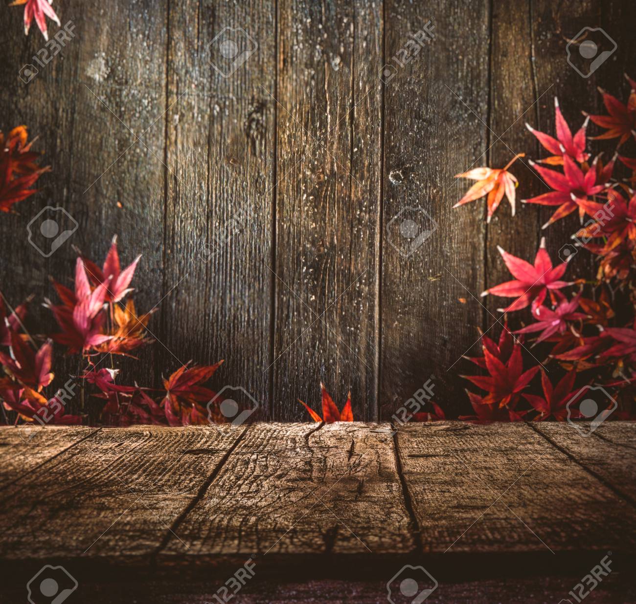 Wooden table. Autumn design with leaves and empty display. Space for your montage. Season fall background - 61520725 Wooden table. Autumn design with leaves and empty display. Space for your montage. Season fall background - 61520725