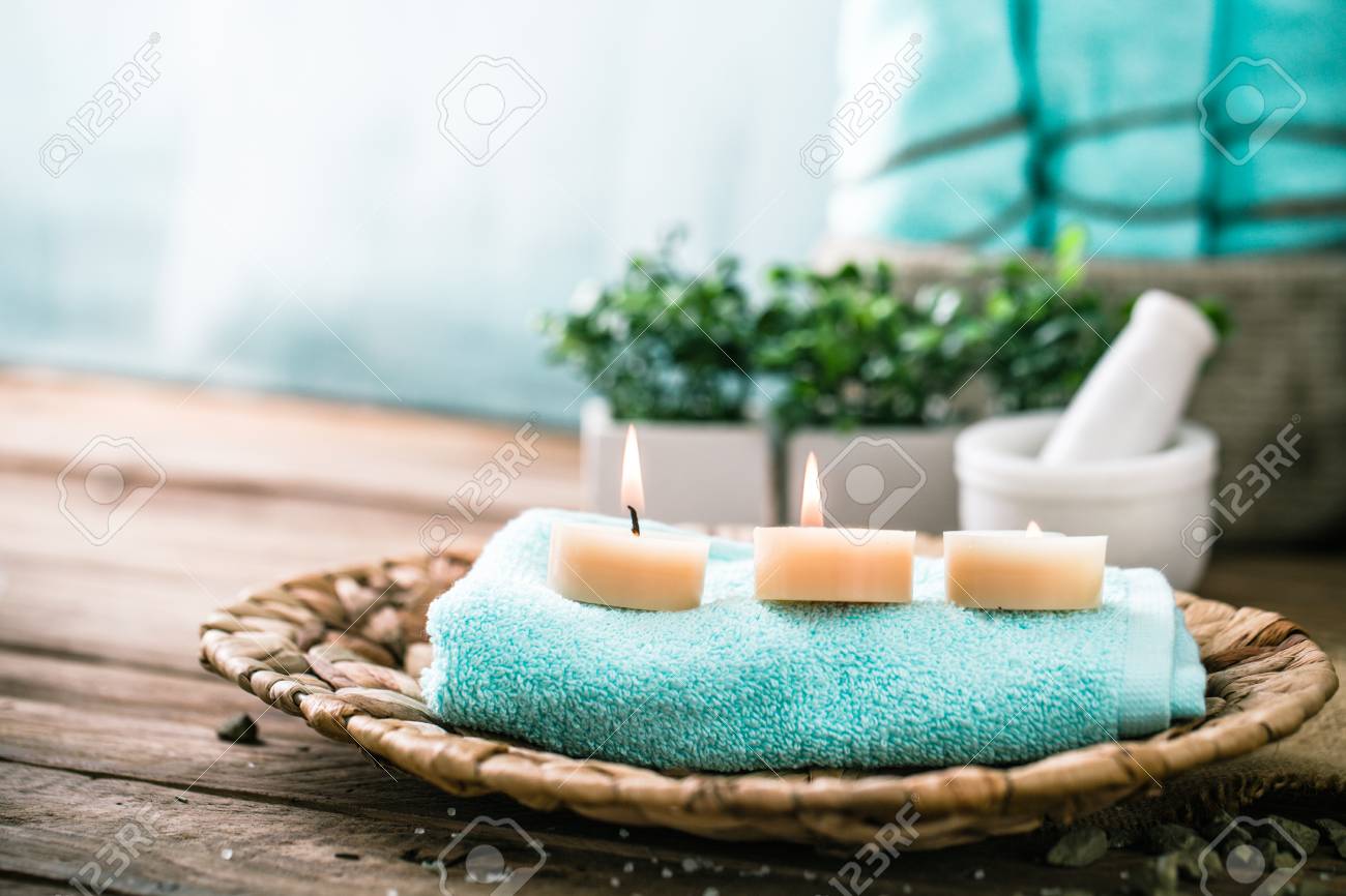 Spa and wellness setting with flowers and towels. Dayspa nature products - 72024042 Spa and wellness setting with flowers and towels. Dayspa nature products - 72024042