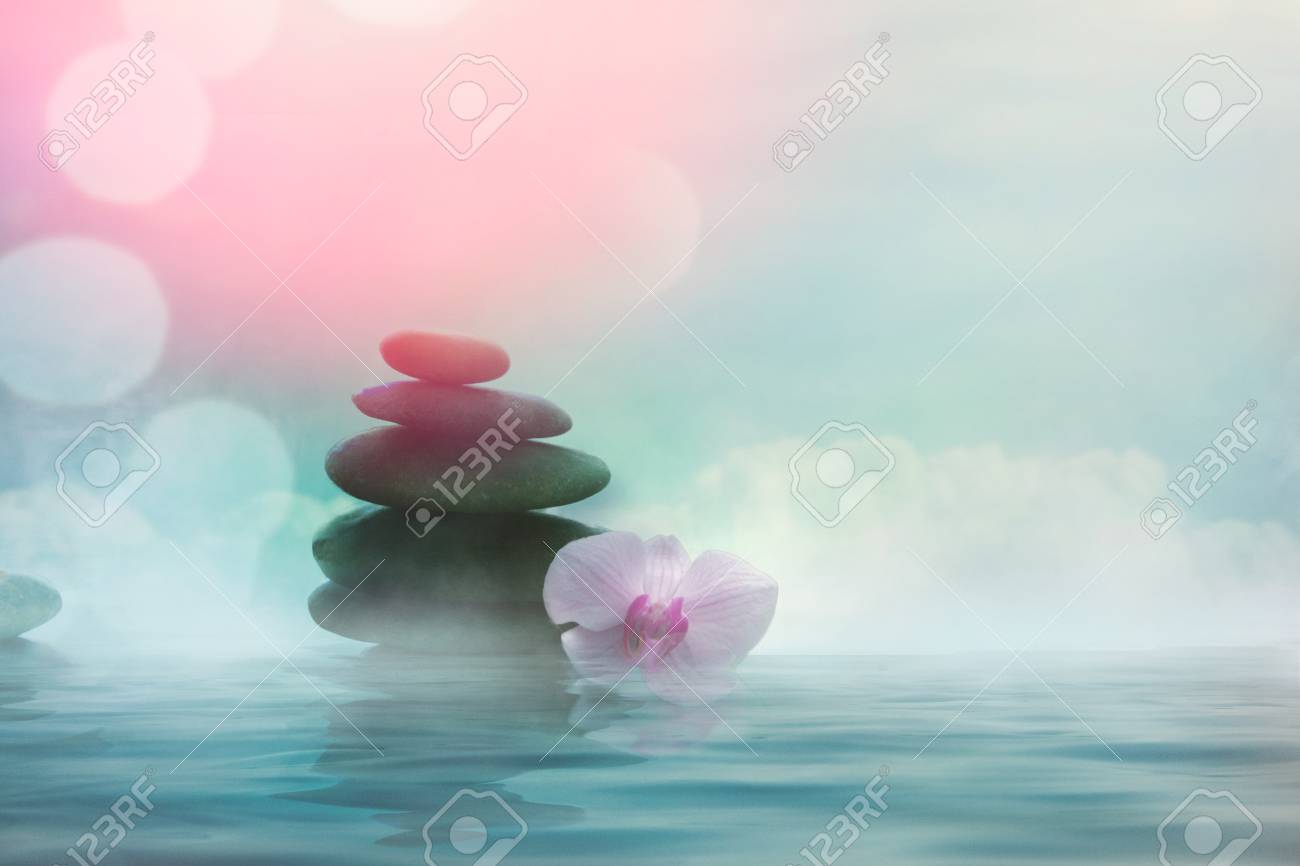 Spa and wellness. Natural massage stones with orchid flower .Spa treatment - 122025042 Spa and wellness. Natural massage stones with orchid flower .Spa treatment - 122025042