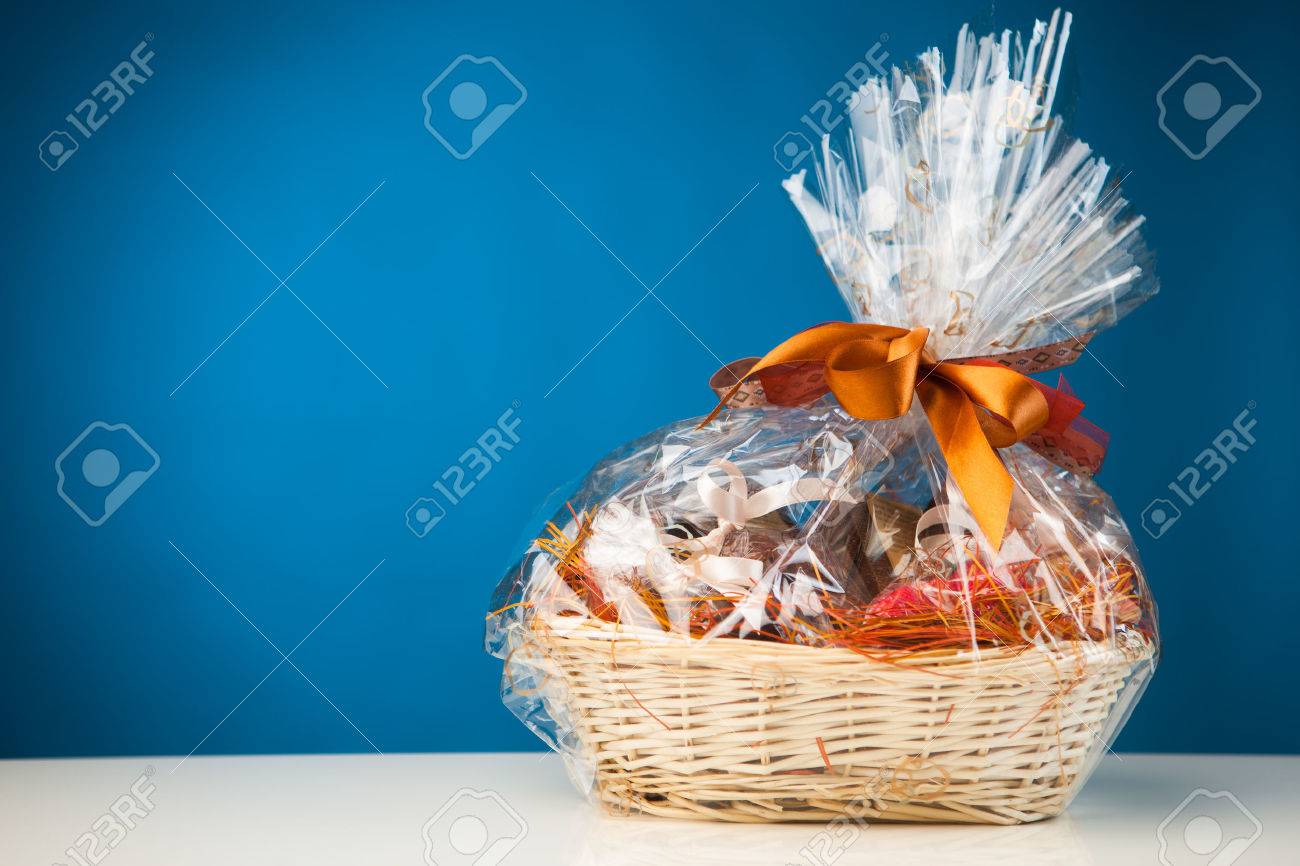 gift basket against blue background - 27018271 gift basket against blue background - 27018271