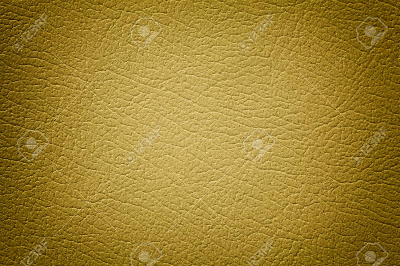 Dark yellow leather texture background, closeup. Golden cracked backdrop from wrinkle skin, structure of textile with vignette. - 129690123 Dark yellow leather texture background, closeup. Golden cracked backdrop from wrinkle skin, structure of textile with vignette. - 129690123