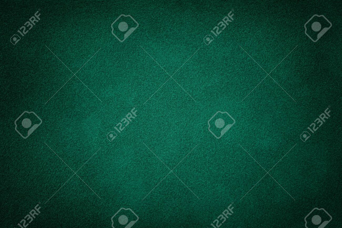 Dark green matte background of suede fabric, closeup. Velvet texture of seamless deep emerald leather. Felt material macro with vignette. - 129690139 Dark green matte background of suede fabric, closeup. Velvet texture of seamless deep emerald leather. Felt material macro with vignette. - 129690139