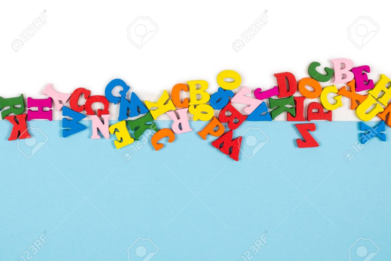 Row of multicolored letters isolated on a white background. Copy space. Frame. - 139807823 Row of multicolored letters isolated on a white background. Copy space. Frame. - 139807823