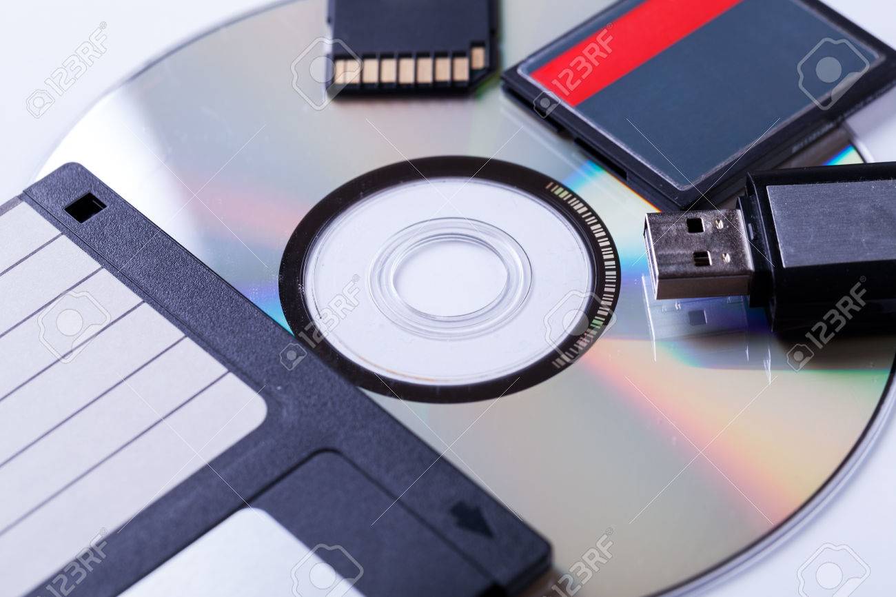 Selection Of Different Computer Storage Devices For Data And Information Including A CD DVD Selection Of Different Computer Storage Devices For Data And Information Including A CD DVD