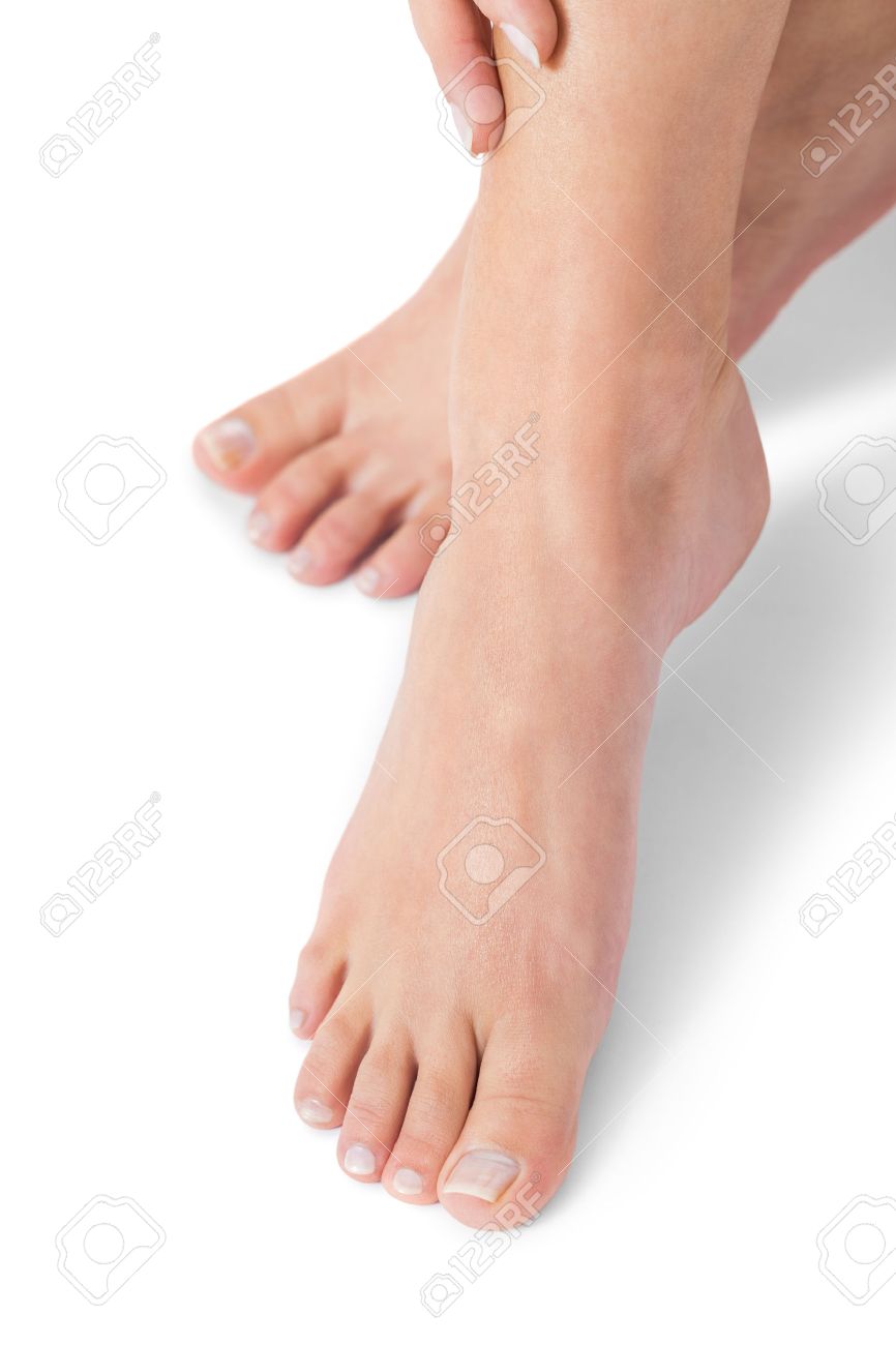 Woman With Neat Manicured Natural Nails Without Nail Varnish Showing Her Hands And Bare Feet In A Beauty Concept On A White Background Stock Photo, Picture And Royalty Free Image. Image 31970994. Woman With Neat Manicured Natural Nails Without Nail Varnish Showing Her Hands And Bare Feet In A Beauty Concept On A White Background Stock Photo, Picture And Royalty Free Image. Image 31970994.