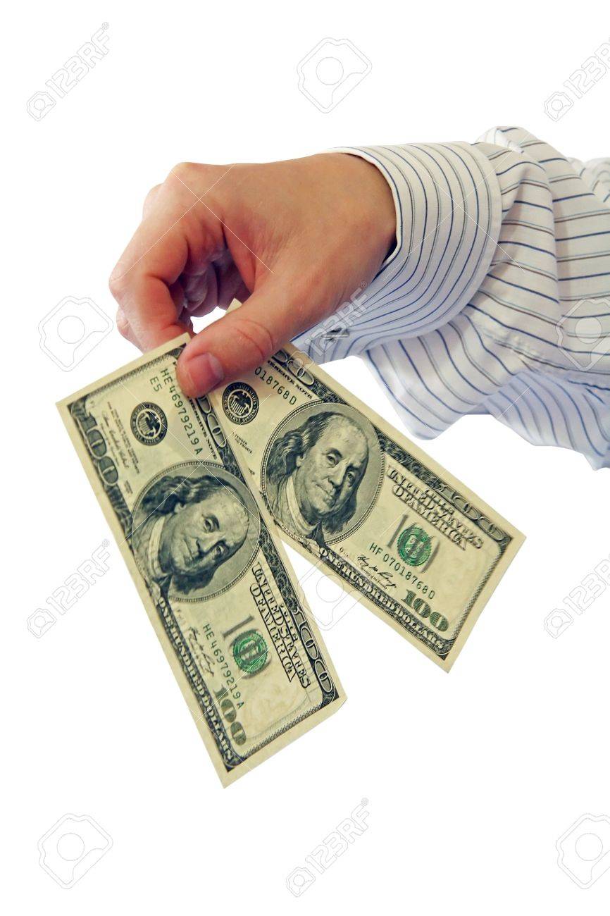 남자는 200 달러의 손에 보유하고있다. 로열티 무료 사진, 그림, 이미지 그리고 스톡포토그래피. Image 5545292