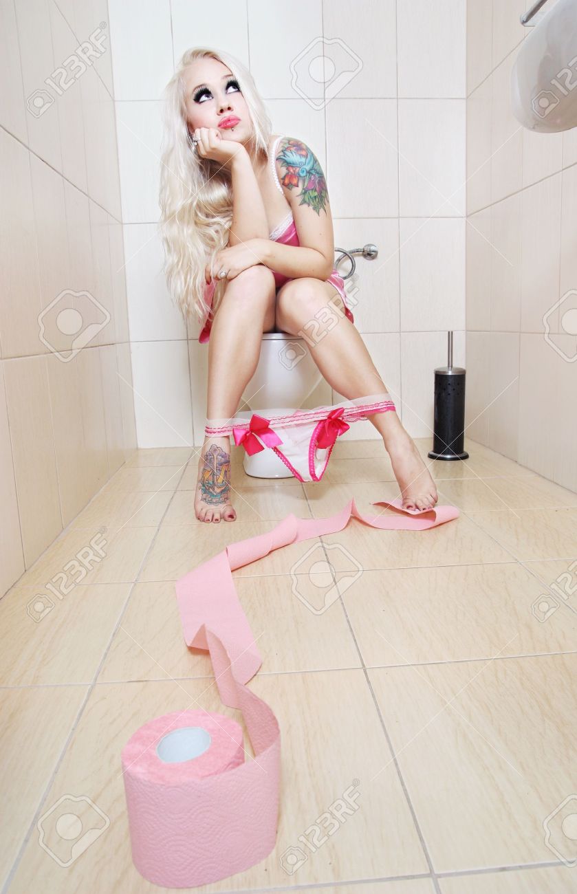 16622249-girl-in-the-toilet.jpg