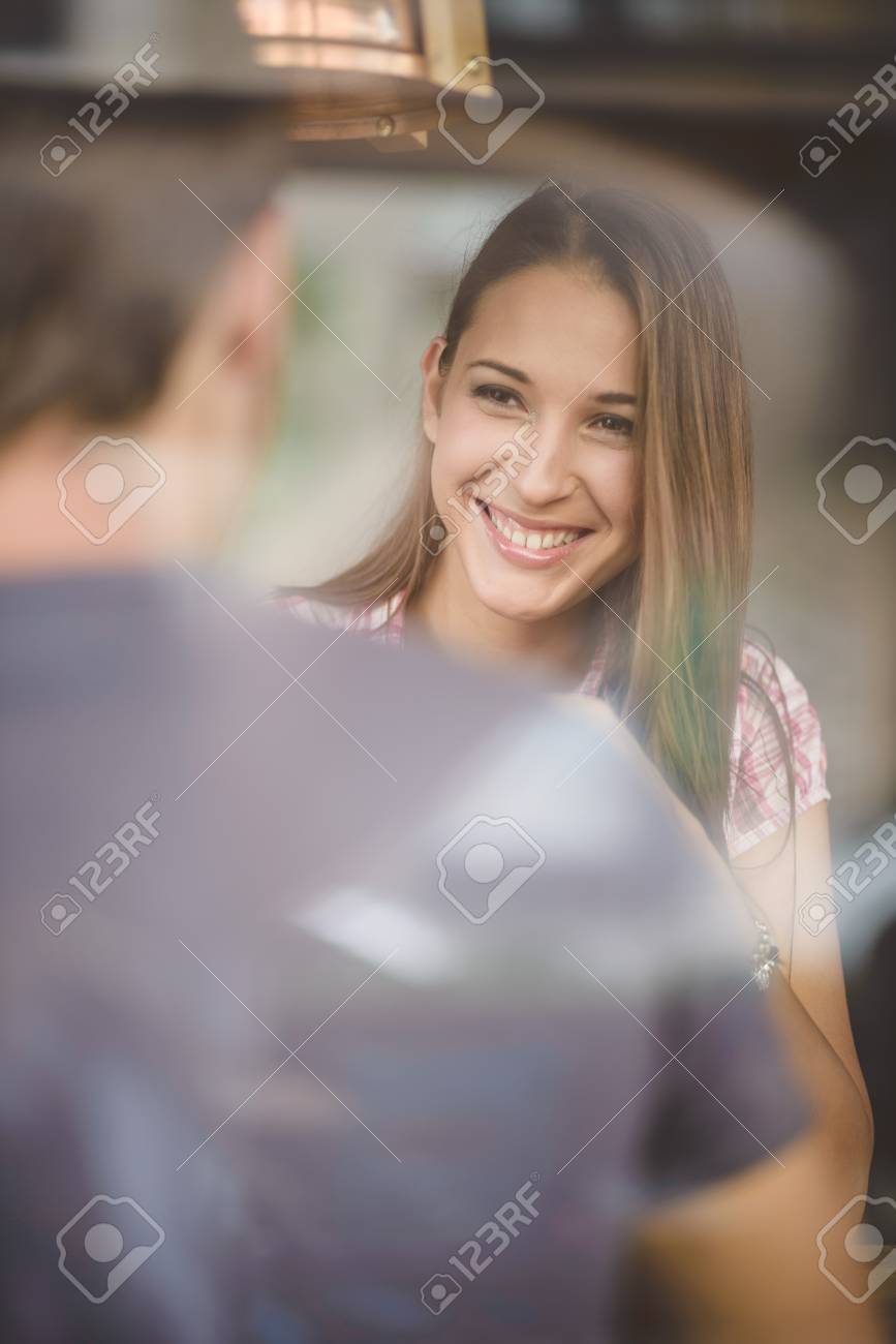 Young couple on first date drinking coffee - 32277704 Young couple on first date drinking coffee - 32277704