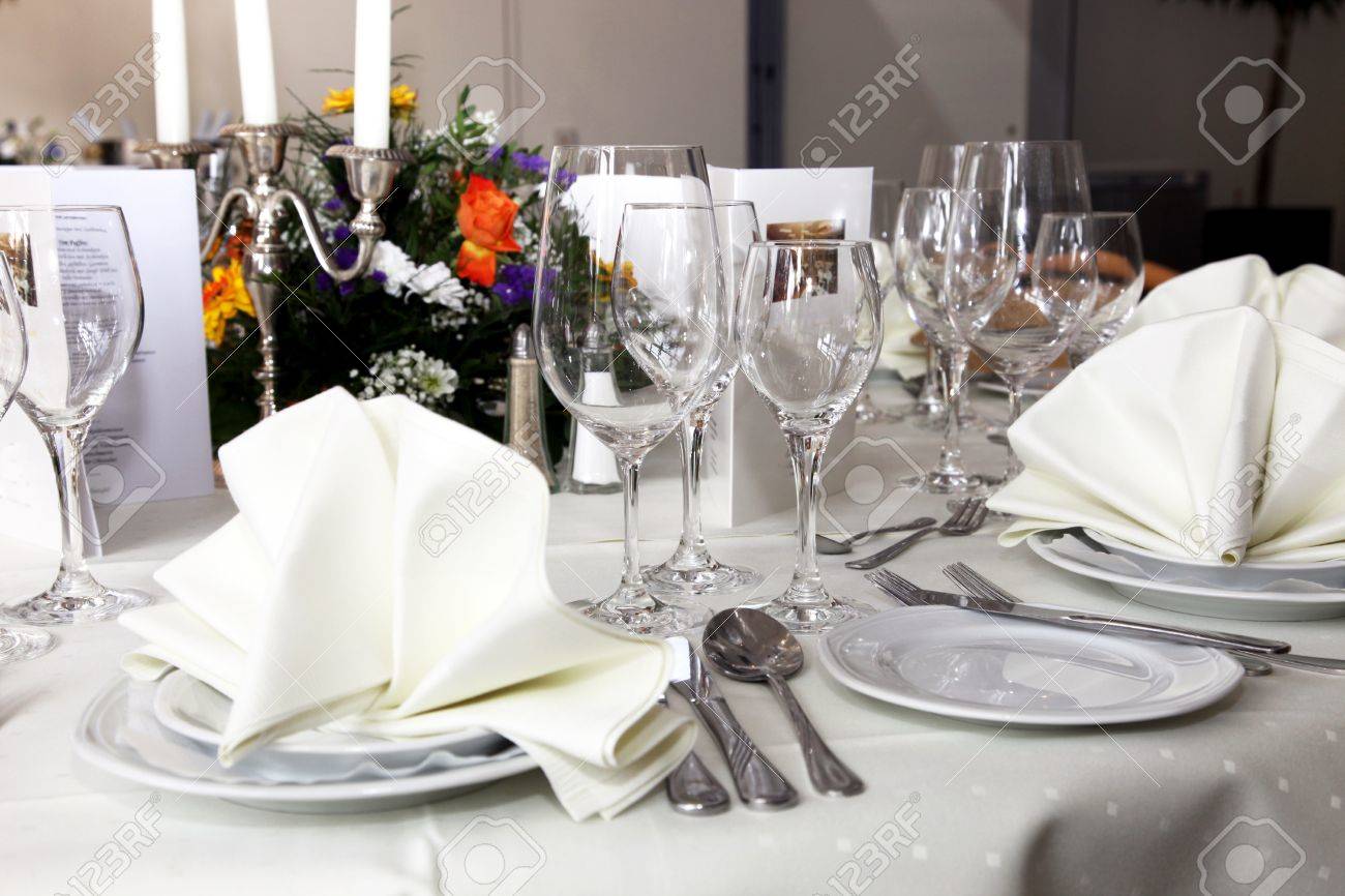 Stylish White Table Setting With Elegant Glassware, Silverware ... Stylish White Table Setting With Elegant Glassware, Silverware ...