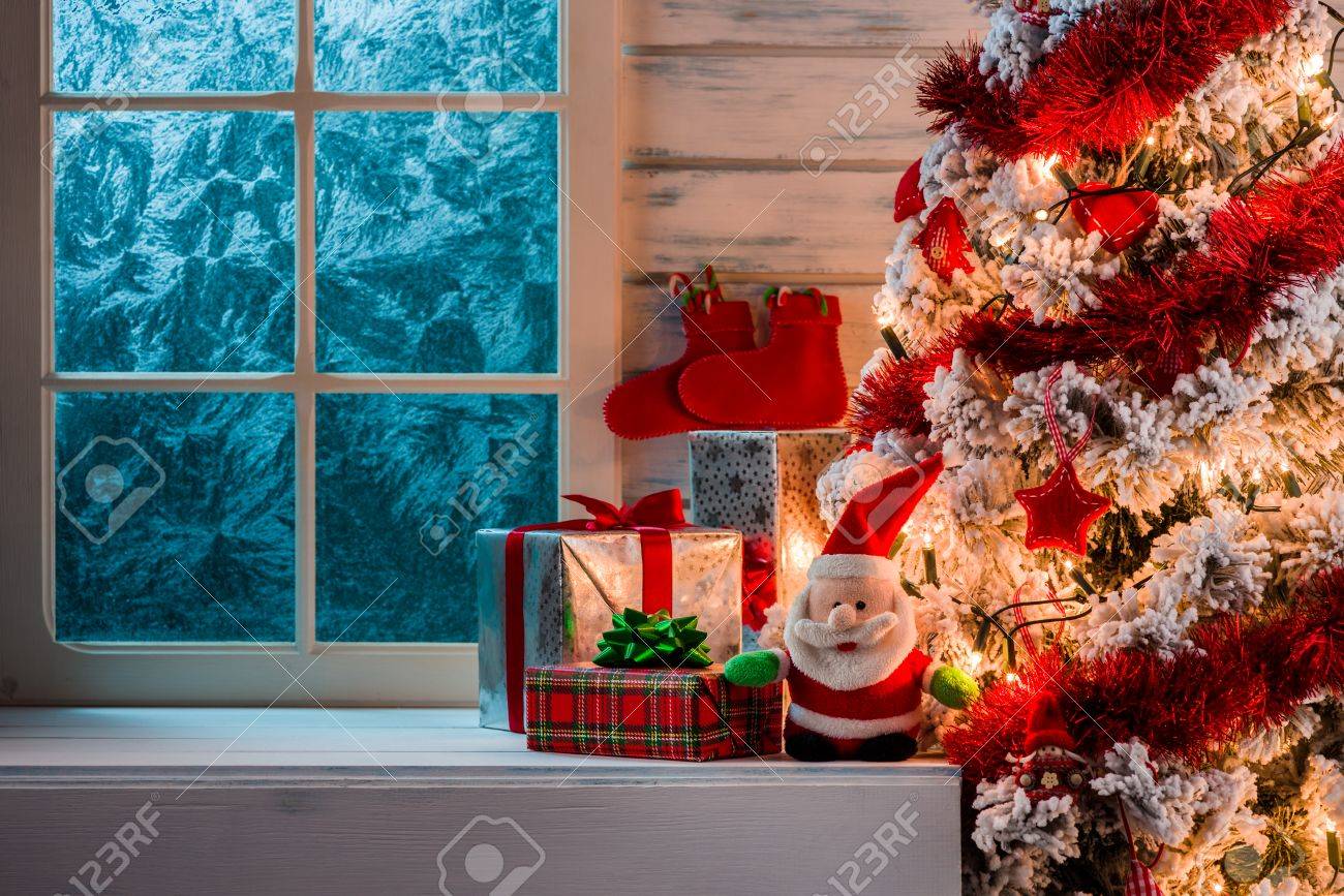 Christmas Scene With Tree Gifts And Frozen Window In Background Stock  Photo, Picture and Royalty Free Image. Image 48699501., image size:1300x867