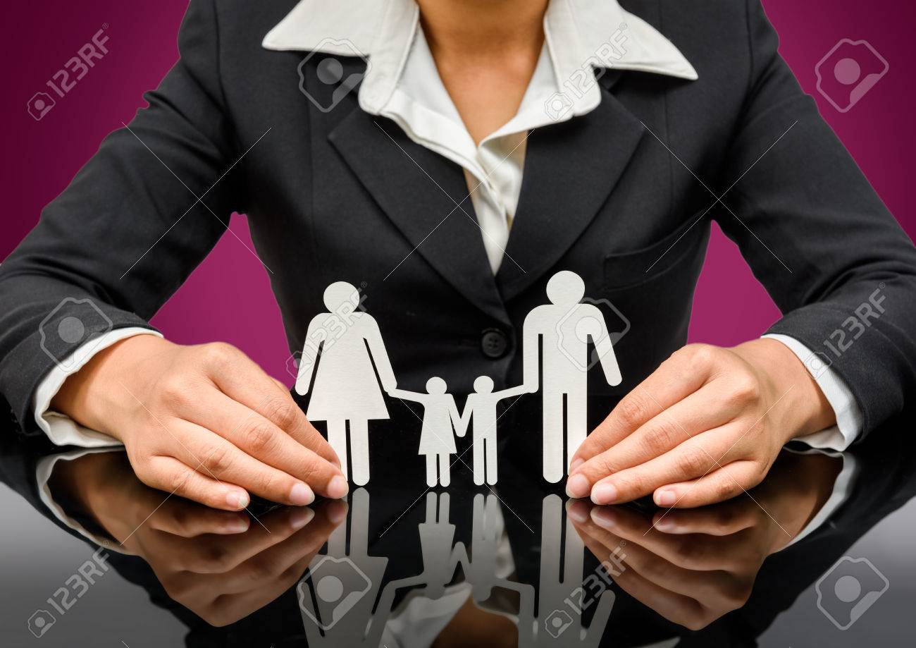 people, charity and care concept - close up of business woman hands holding paper family. isolated on white background with clipping path - 43957492 people, charity and care concept - close up of business woman hands holding paper family. isolated on white background with clipping path - 43957492