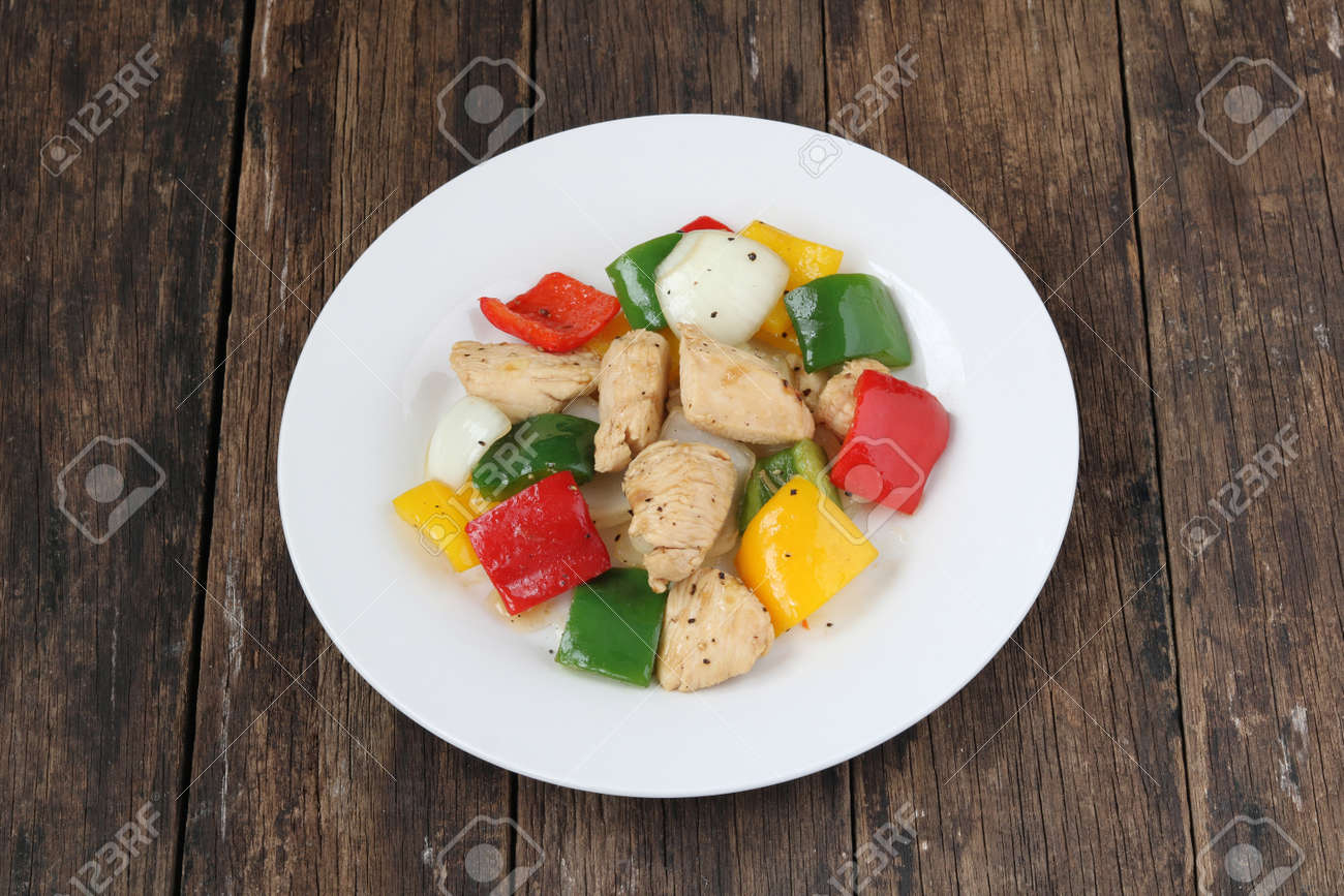 Stir fried chicken and sweet pepper.Homemade meal for good health - 157210632 Stir fried chicken and sweet pepper.Homemade meal for good health - 157210632