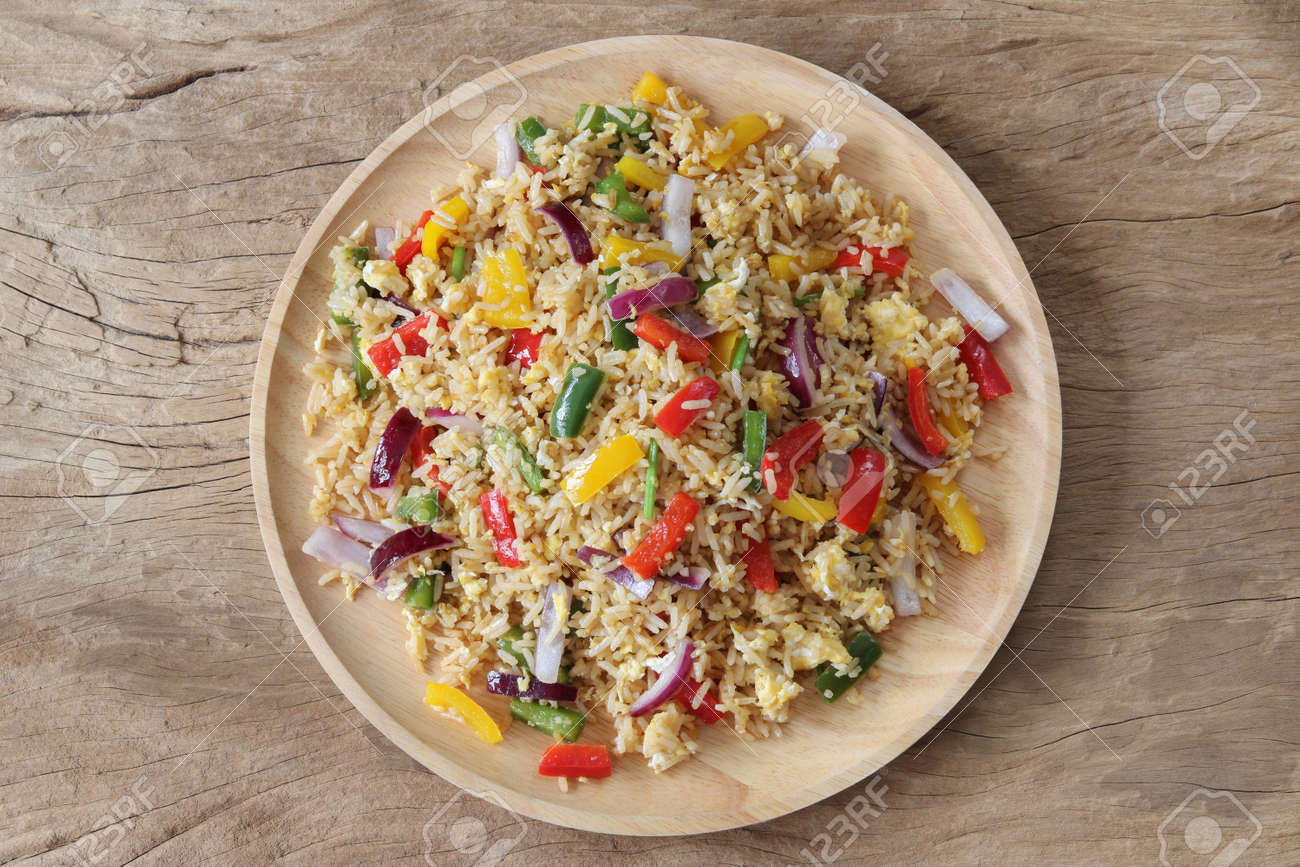 Fried rice with sweet pepper and egg top view .Homemade meal for good health - 157213023 Fried rice with sweet pepper and egg top view .Homemade meal for good health - 157213023