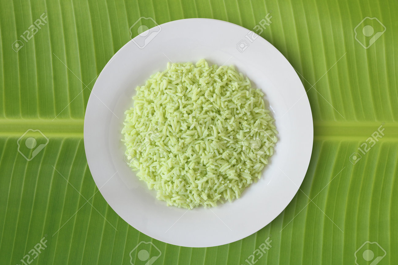 Pandan flavoured rice organic food for good heath on banana leaf top view - 161833193 Pandan flavoured rice organic food for good heath on banana leaf top view - 161833193