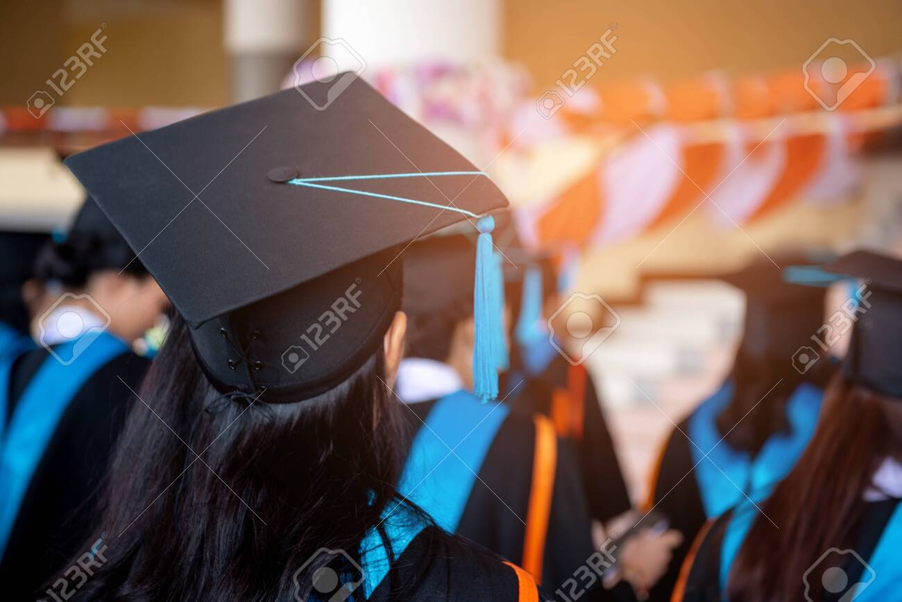 Graduates wear black hats, black hats.Graduates join the graduation ceremony at the university. - 121332148 Graduates wear black hats, black hats.Graduates join the graduation ceremony at the university. - 121332148