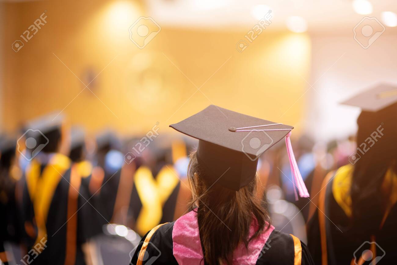 Graduates wear black hats, black hats.Graduates join the graduation ceremony at the university. - 121332369 Graduates wear black hats, black hats.Graduates join the graduation ceremony at the university. - 121332369