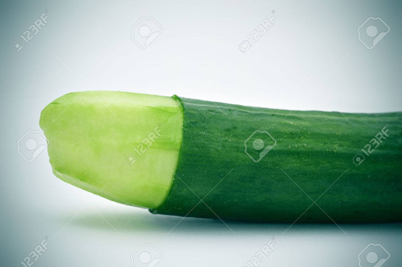 closeup of a cucumber with the skin of its tip removed depicting a circumcised male member - 65840109 closeup of a cucumber with the skin of its tip removed depicting a circumcised male member - 65840109