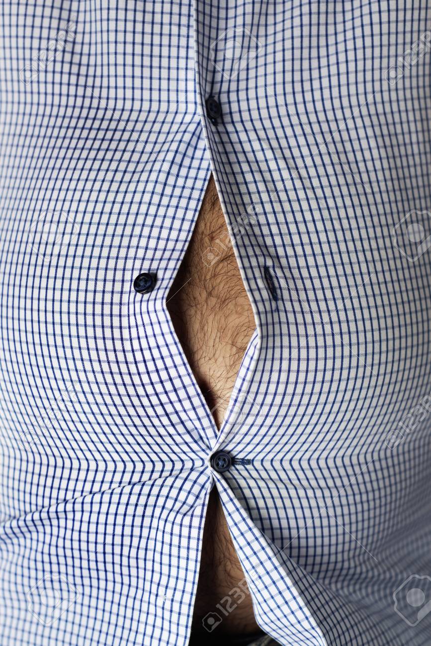 Closeup Of A Caucasian Man, With A Hairy Beer Belly Seen Through The Buttons Of His Tight Shirt Stock Photo, Picture And Royalty Free Image. Image 122708457.