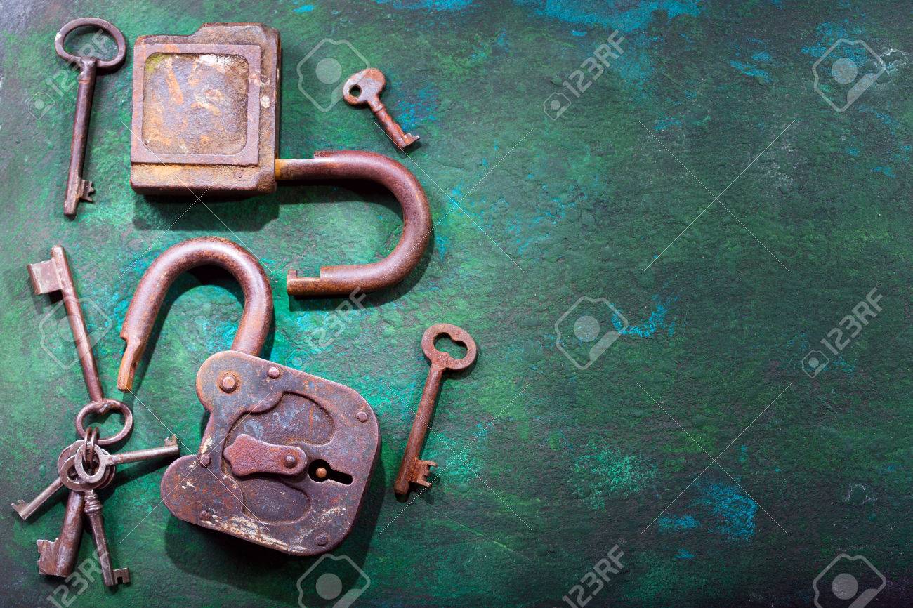 old locks and keys on rusty background stock photo picture and