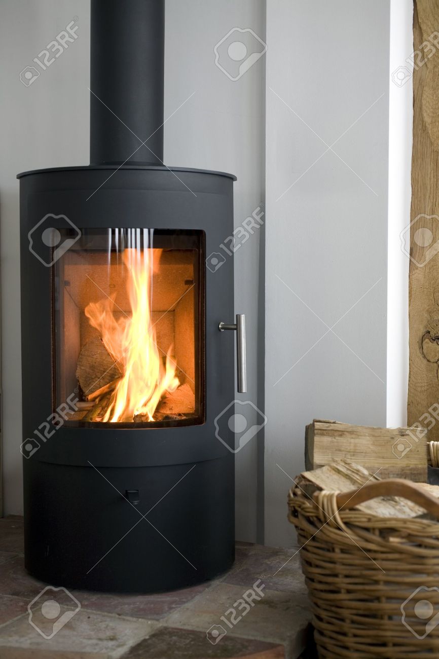 modern wood burning stove in modern interior stock photo picture