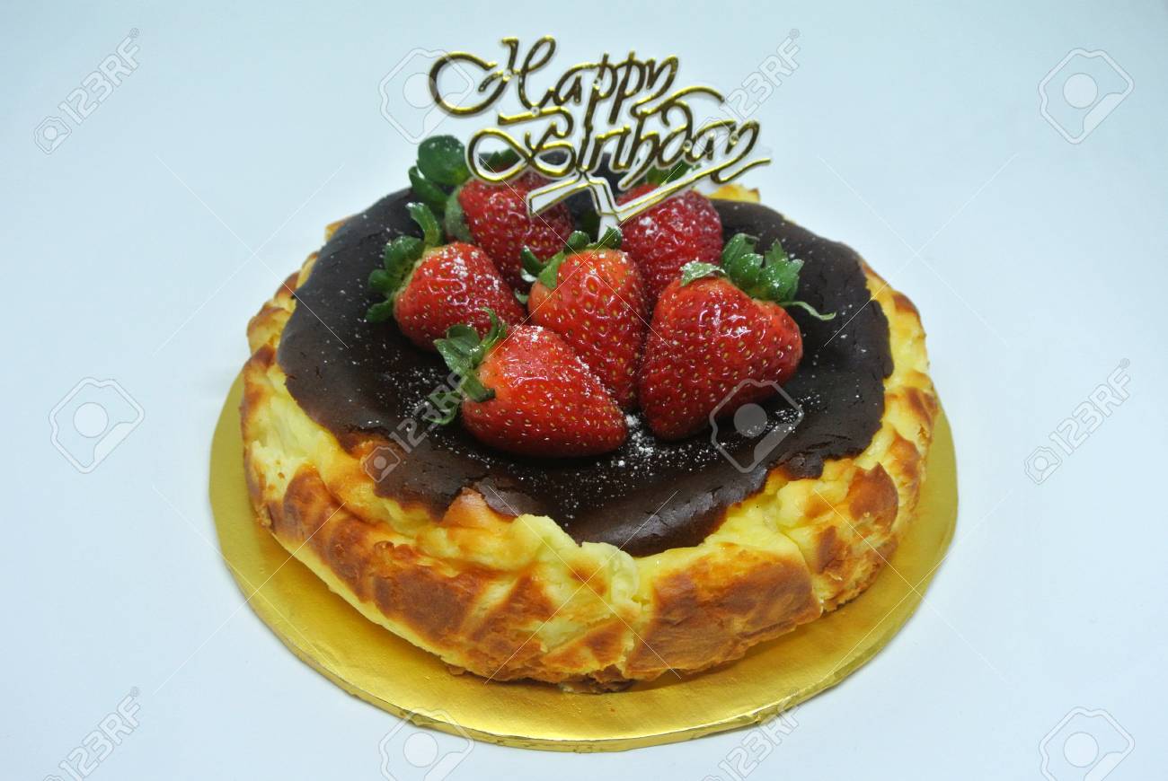Basque Burnt Cheesecake With Six Strawberry And Happy Birthday Stock Photo Picture And Royalty Free Image Image 115456555