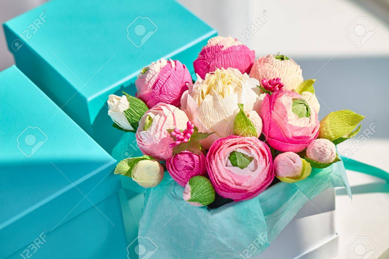 bright bouquet of paper flowers in turquoise square box stock photo paper flower boxes