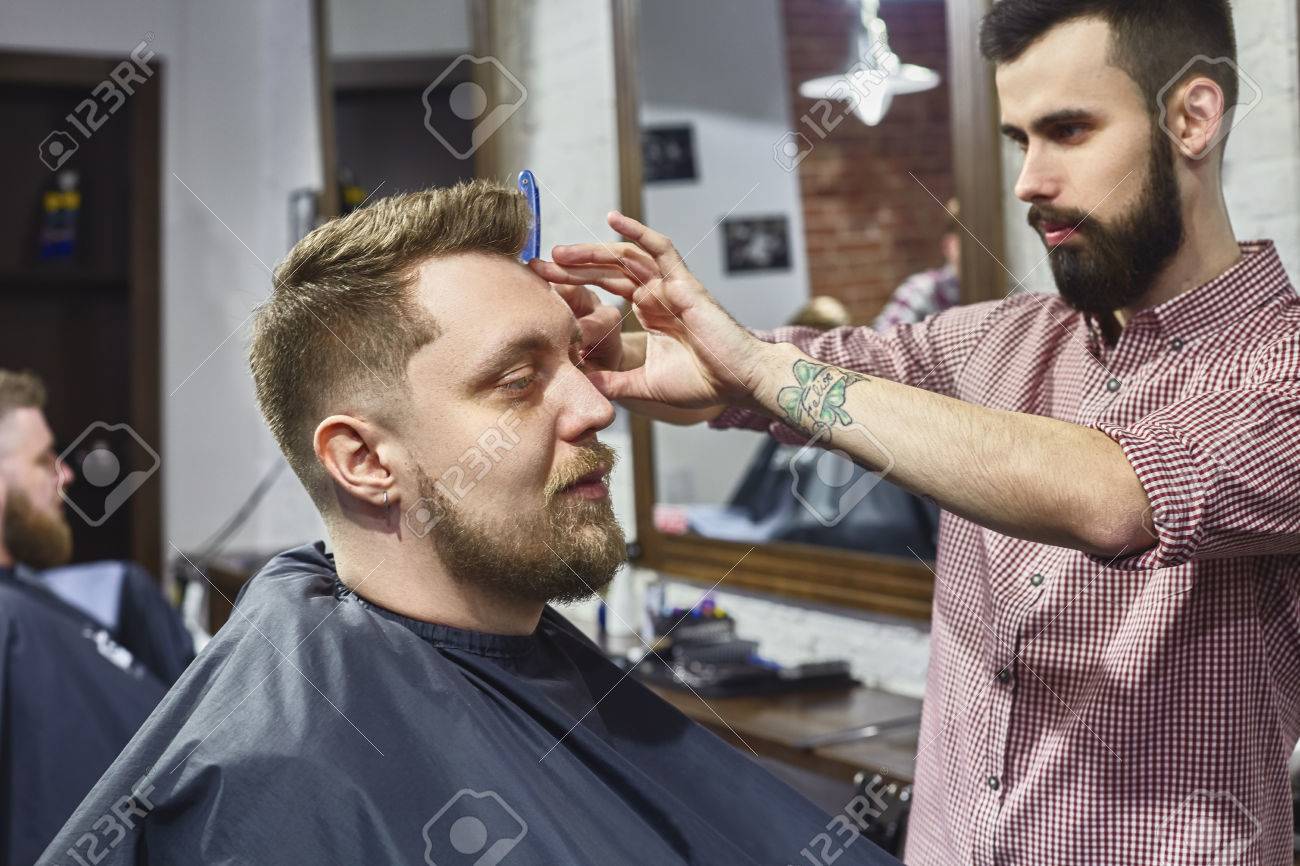 Men S Haircut In The Barber Shop The Work Of The Master
