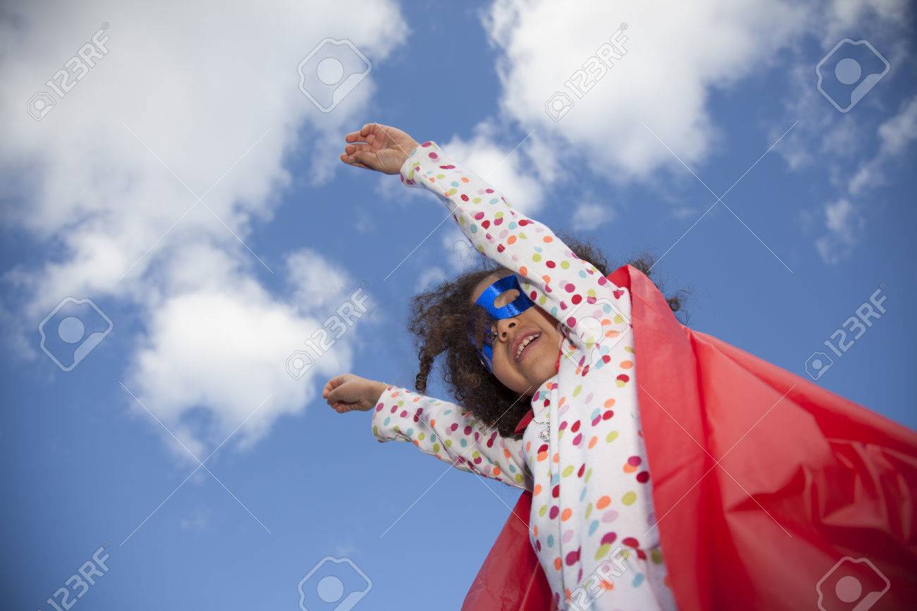 little girl superhero against blue sky - 39761928 little girl superhero against blue sky - 39761928