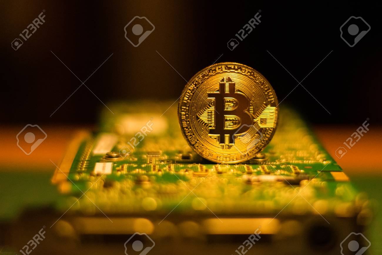 Bitcoin Graphic Card Mining On A Blurry Dark Background Stock Photo,  Picture and Royalty Free Image. Image 100964048.