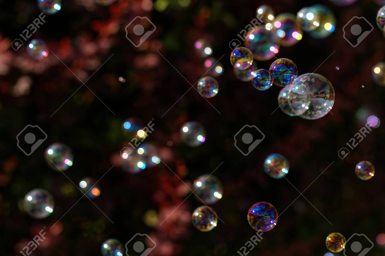 the rainbow bubbles from the bubble blower stock photo picture and