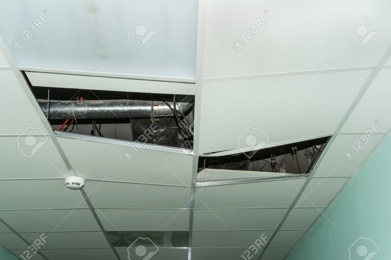 Broken Metal Rails Of A Modern False Ceiling With A Built In