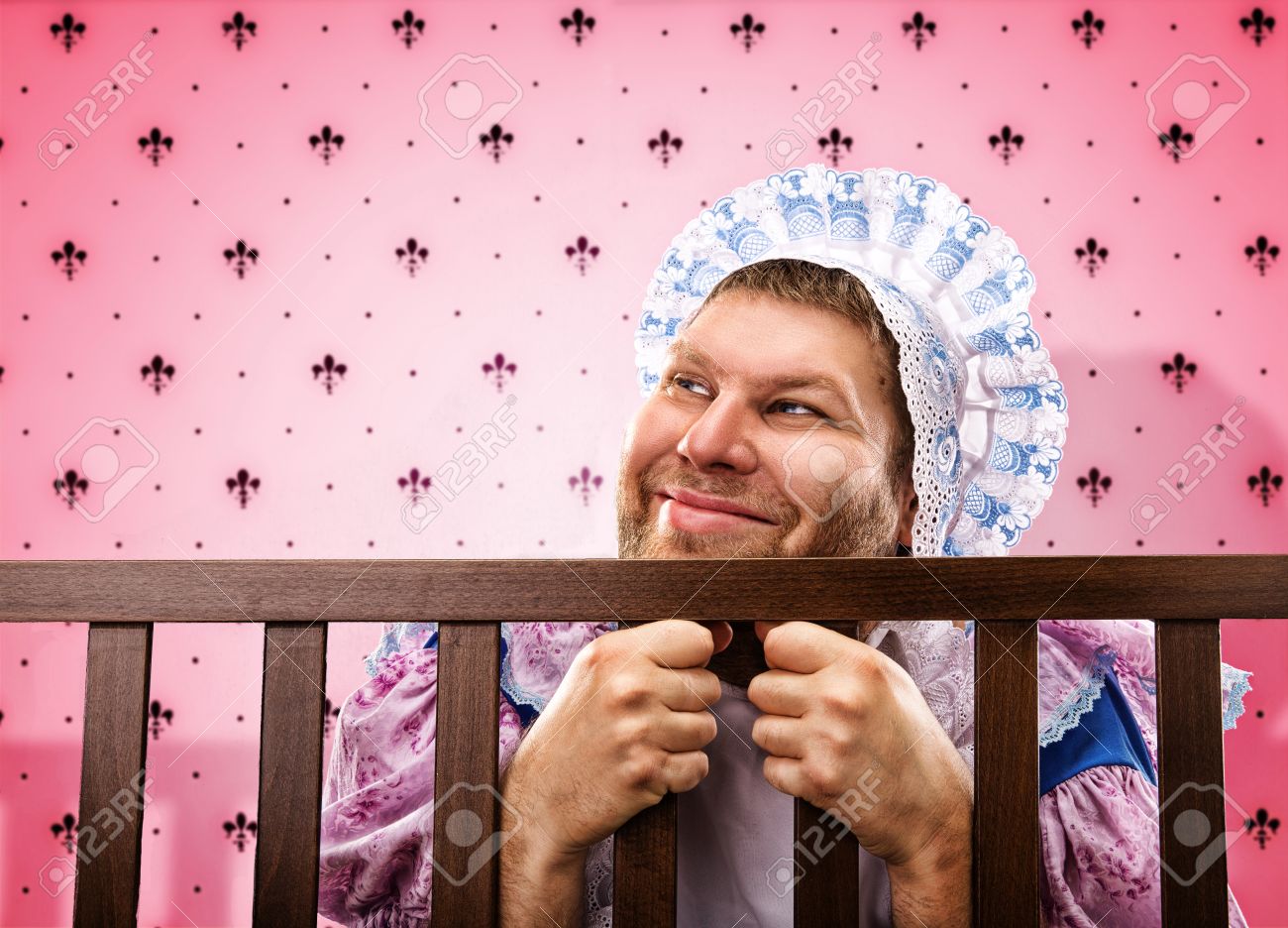 Adult Man Weared As Baby In Playpen Looking Out Stock Photo Picture And Royalty Free Image Image
