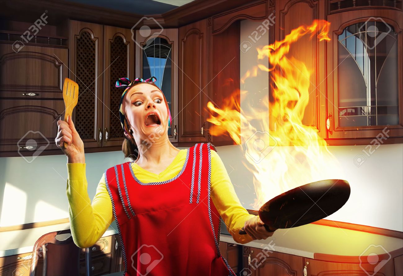 Housewife Cooking On The Kitchen With Big Fire Stock Photo Picture And Royalty Free Image Image 26869864