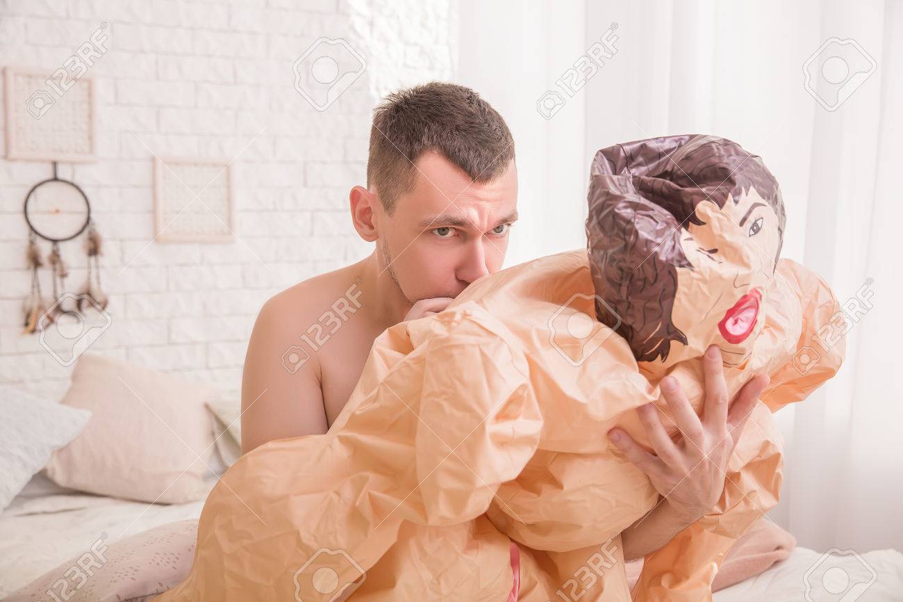 Naked Man Blow-up Sex Doll. Preparing For Sexual Games Concept. Stock  Photo, Picture And Royalty Free Image. Image 68512511.