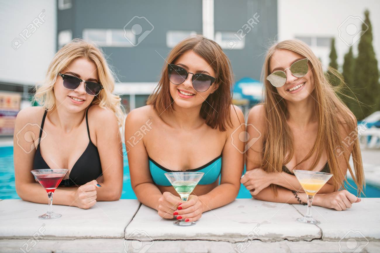 Sexy girls poolside