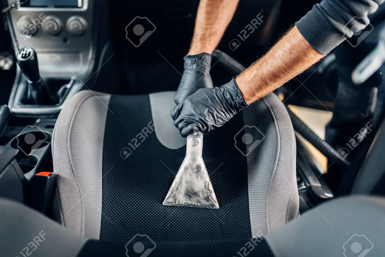 Cleaning Of Interior Of The Car With Vacuum Cleaner, Car Cleaning Stock  Photo, Picture and Royalty Free Image. Image 67558970.