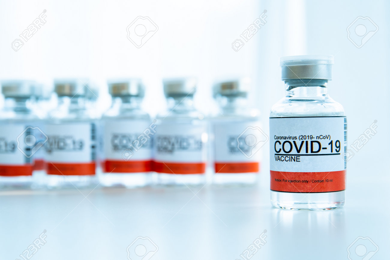 Coronavirus - 2019-nCoV or COVID-19 vaccine bottles for injection use only. Urgent vaccine research and production use in COVID-19 - Coronavirus disease. COVID-19 vaccine close up with copyspace. - 161784741 Coronavirus - 2019-nCoV or COVID-19 vaccine bottles for injection use only. Urgent vaccine research and production use in COVID-19 - Coronavirus disease. COVID-19 vaccine close up with copyspace. - 161784741