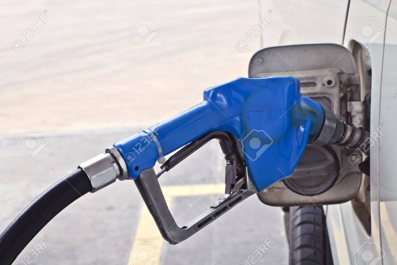 A Blue Fuel Dispenser Connecting To The Car Add Fuel Put In Gasoline Benzene Diesel Stock Photo Picture And Royalty Free Image Image 47338577