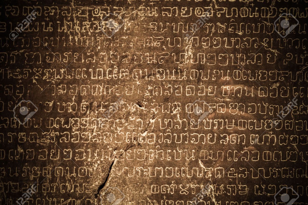 Ancient Thai writing chiseled on stone - 25894554 Ancient Thai writing chiseled on stone - 25894554