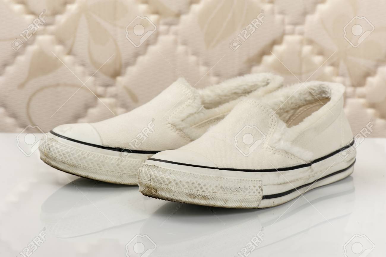 Closeup White Women Canvas Sneakers 