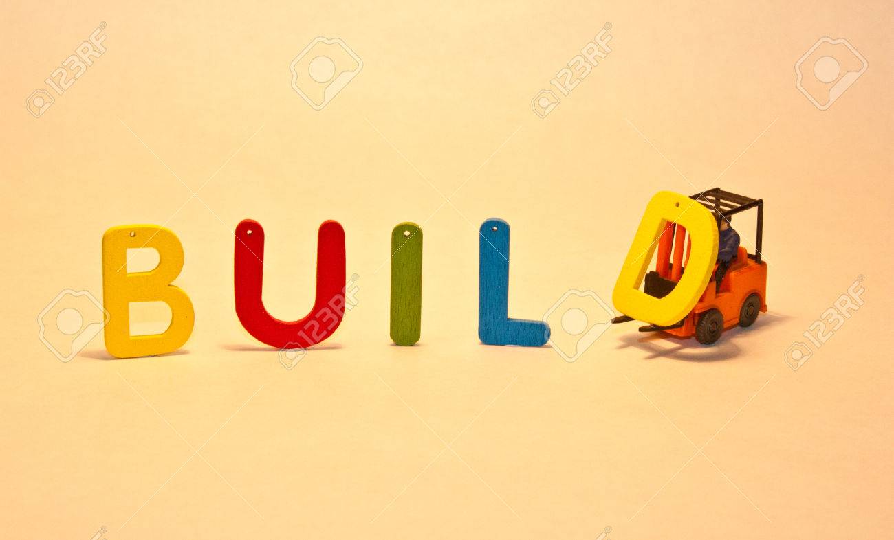 colorful wooden letters that spell the word build stock photo