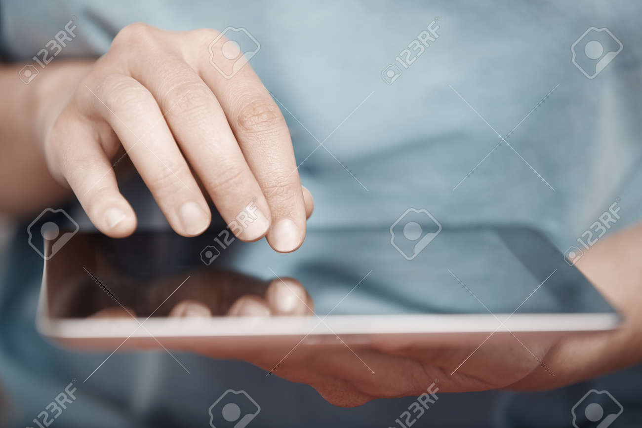 Human hands working with digital tablet - 26176439 Human hands working with digital tablet - 26176439