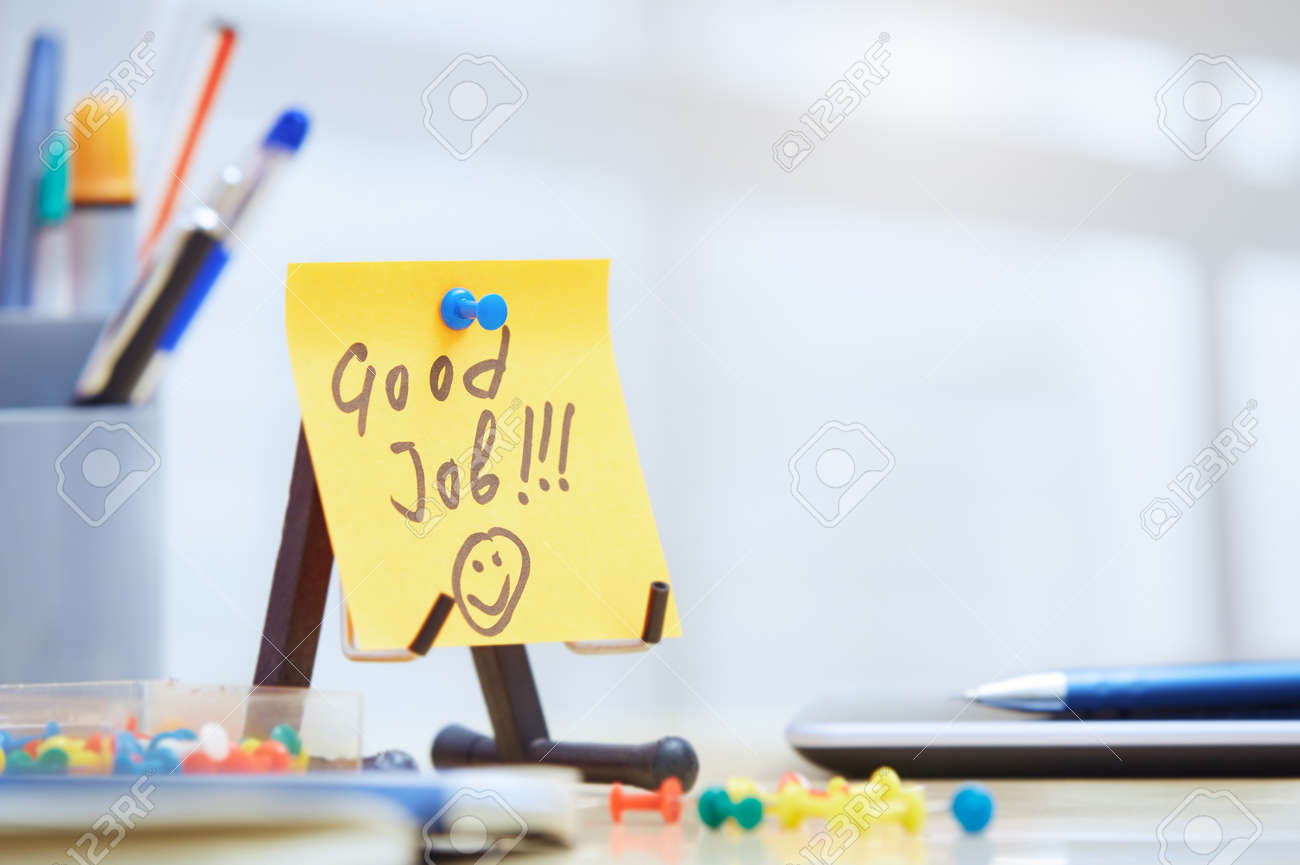 Good job text on adhesive note at office - 55411536 Good job text on adhesive note at office - 55411536