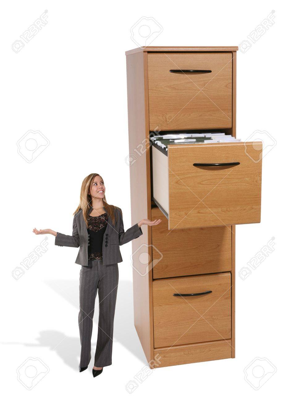 A Pretty Woman Looking Frsutrated At A Large File Cabinet Stock Photo Picture And Royalty Free Image Image 782403