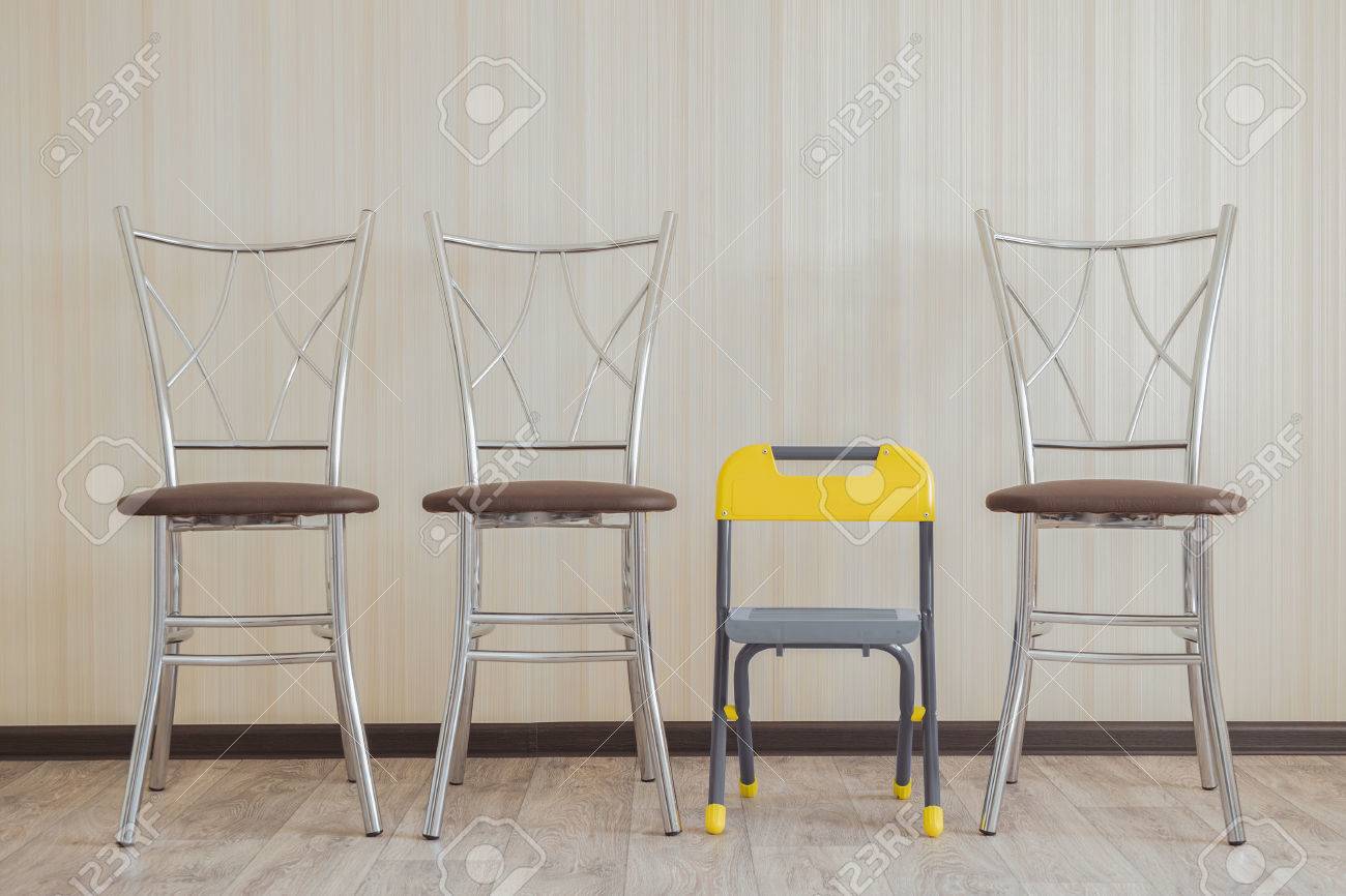 Three Chairs For Adults And Children S High Chair In The Same Stock Photo Picture And Royalty Free Image Image 62768229