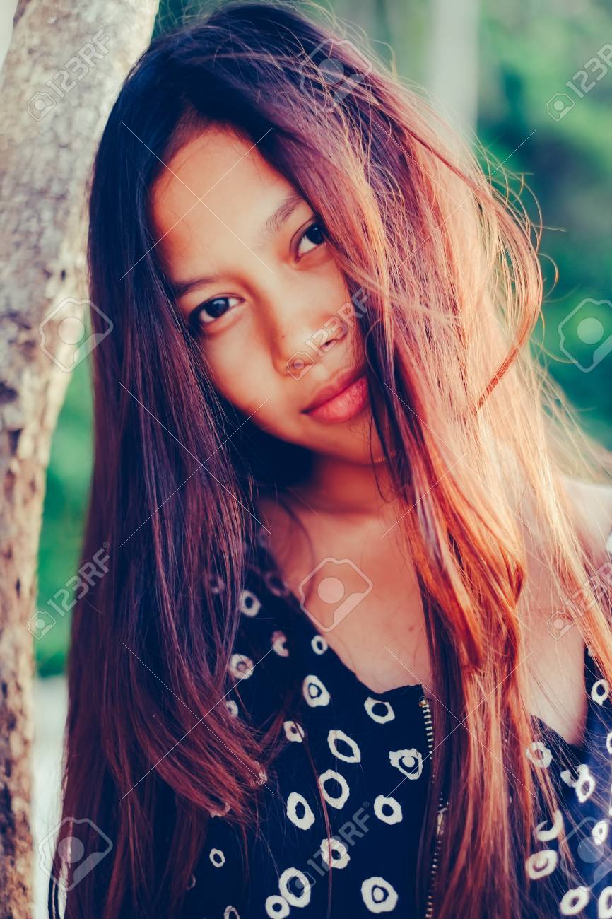 Natural Portrait Of Beautiful Young Asian Girl Smiling With Messy Hair Stock Photo Picture And Royalty Free Image Image 78250454