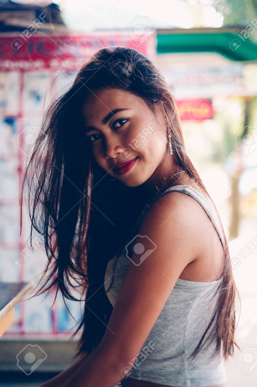 Portrait Of A Beautiful And Sexy Asian Girl Posing With Dark Red Lipstick  Stock Photo, Picture and Royalty Free Image. Image 78227333.