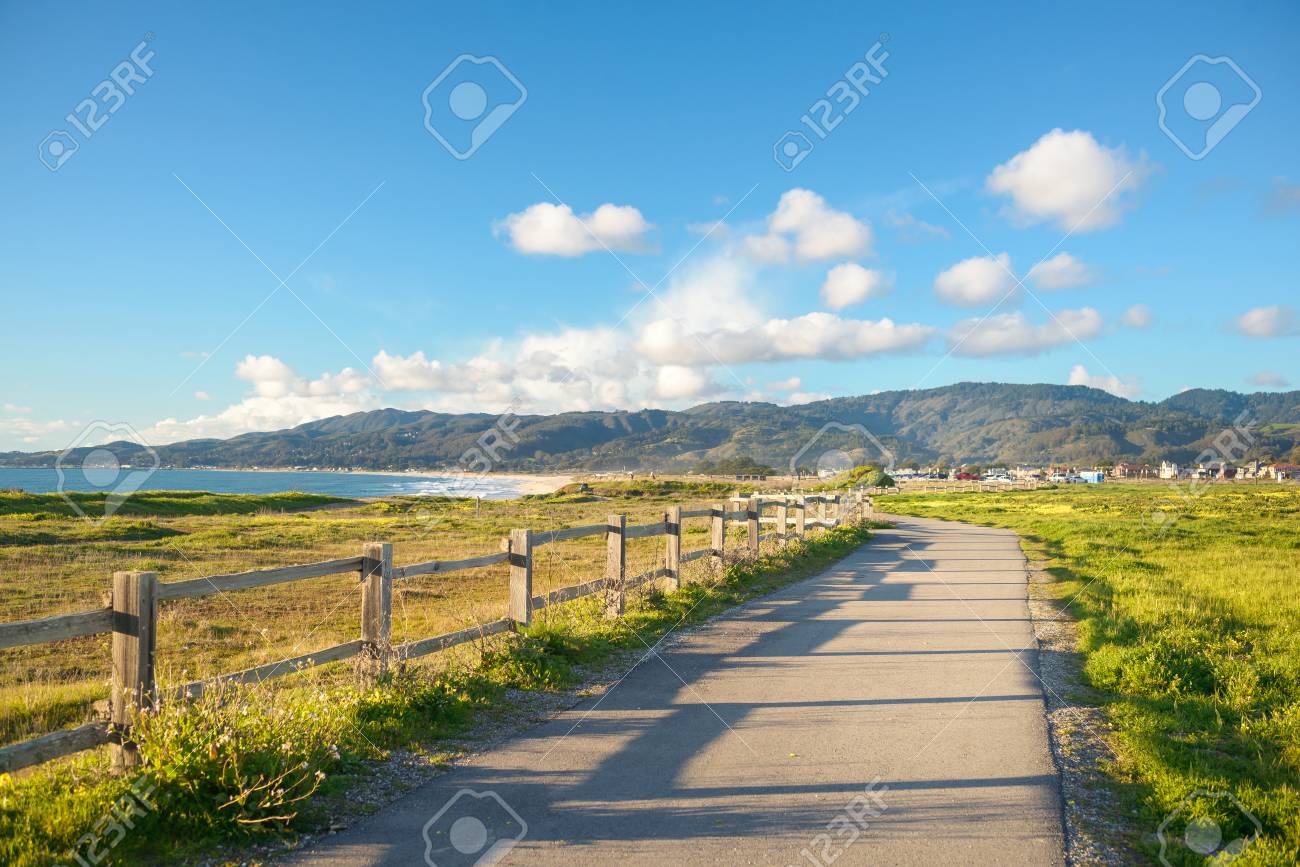 Beautiful scenic road on the green bluff above the ocean beach - 106272130 Beautiful scenic road on the green bluff above the ocean beach - 106272130