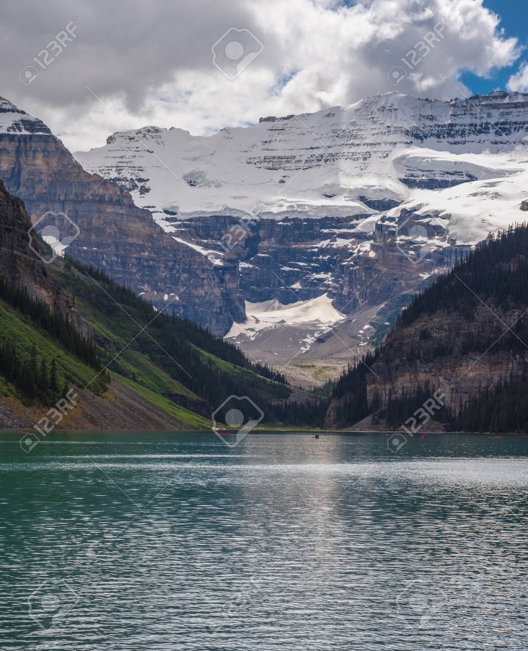 Lake Louise with mountain cover by snow on the background in sunny summer day, Alberta., Canada - 115023899 Lake Louise with mountain cover by snow on the background in sunny summer day, Alberta., Canada - 115023899